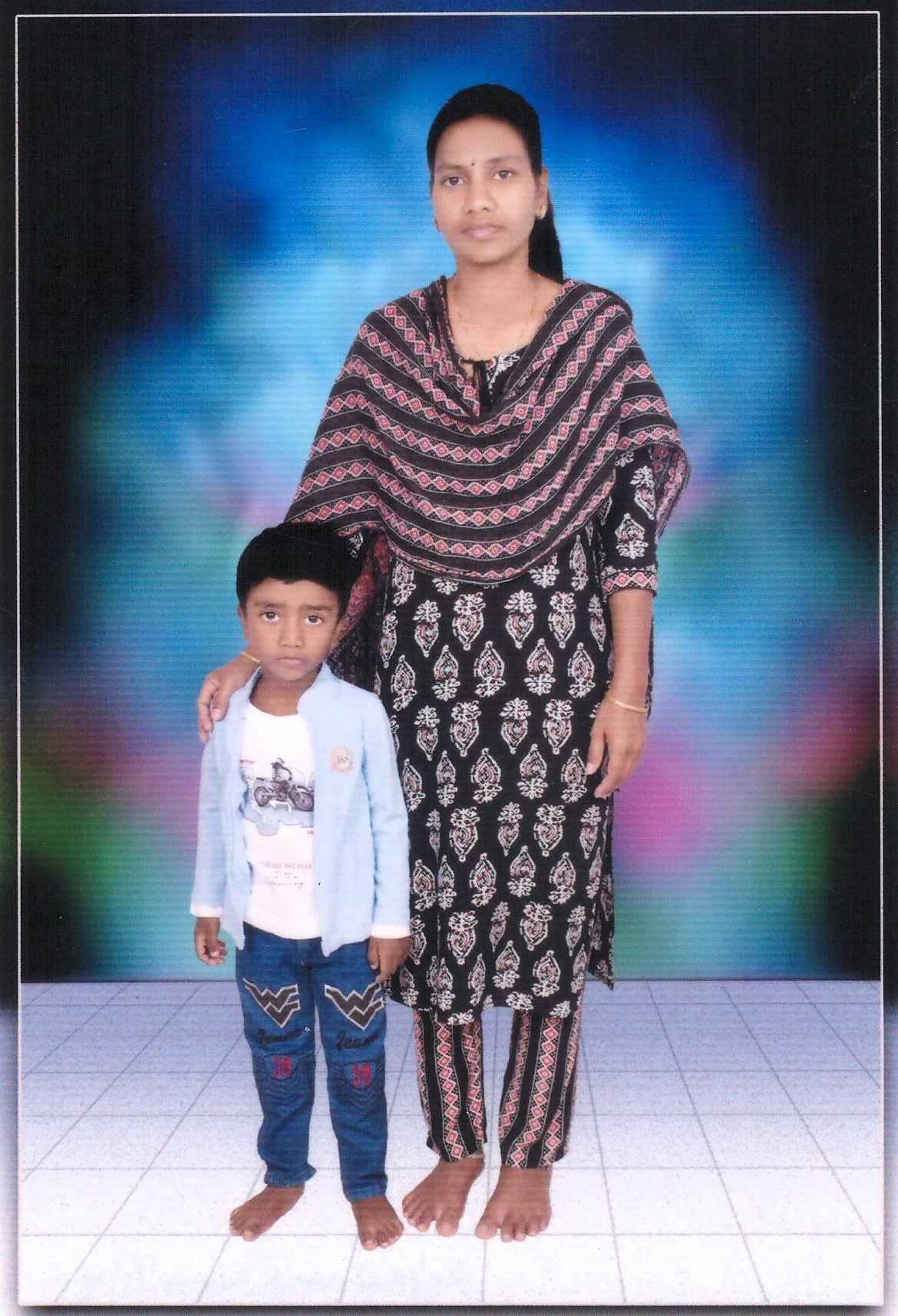 advik with his mother